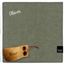 Sittunderlag från Høie i ull, tillsammans med turkopp. Båda med samma namn.