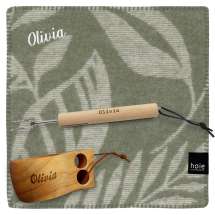 Sittunderlag från Høie i ull, tillsammans med turkopp och grillpinne. Alla tre med samma namn.